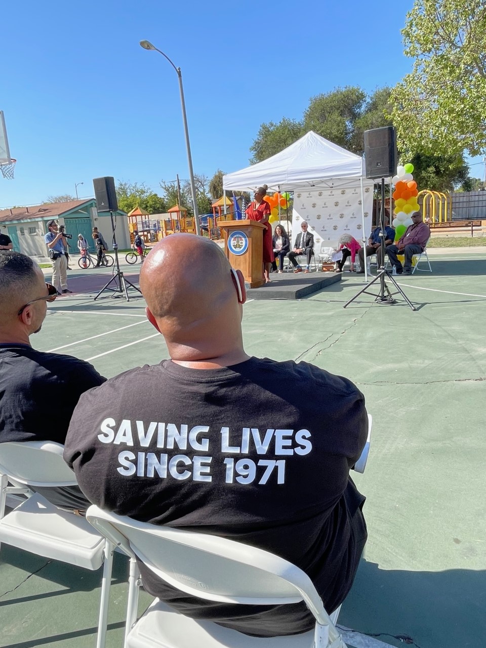 PH Health Week guest wearing black shirt with text 'saving lives since 1971'